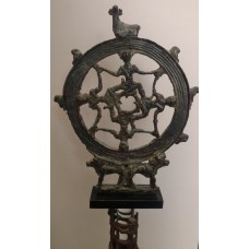 Standard carried by two bulls, four men forming cross